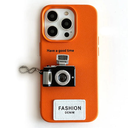 For iPhone 16 Pro Max Case Stereo Camera Decor PC+PU Phone Protective Cover - Orange