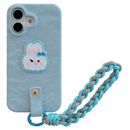 For iPhone 16 Plus Case Cute Pattern Soft PU+PC Phone Back Cover with Braided Handy Strap - Sky Blue Rabbit