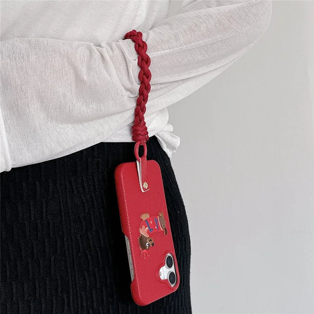 For iPhone 16 Plus Case Christmas Design Cute Dog Pattern PU+PC Phone Back Cover with Braided Handy Strap