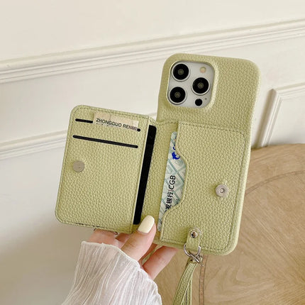 For iPhone 16 Pro Case Card Slots Kickstand PU Leather + PET Phone Cover with Wrist Strap