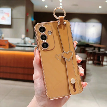 For Samsung Galaxy A55 5G Case Electroplated Heart Pattern TPU Phone Back Cover with Wristband Kickstand - Brown
